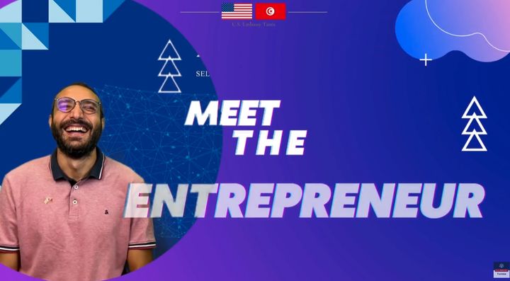 Amine Riahi smiling on the U.S. Embassy Tunis “Meet the Entrepreneur” title card