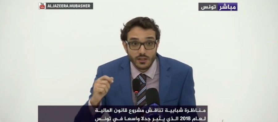 Amine Riahi speaking at a youth debate on Tunisia’s 2018 finance bill, shown on Al Jazeera Mubasher