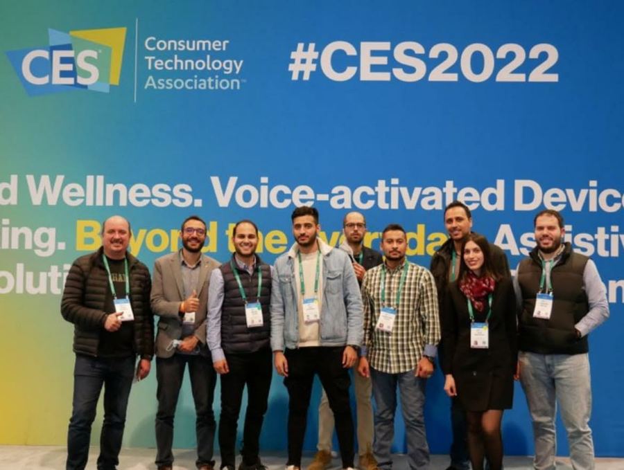 Group of attendees in front of the CES 2022 backdrop